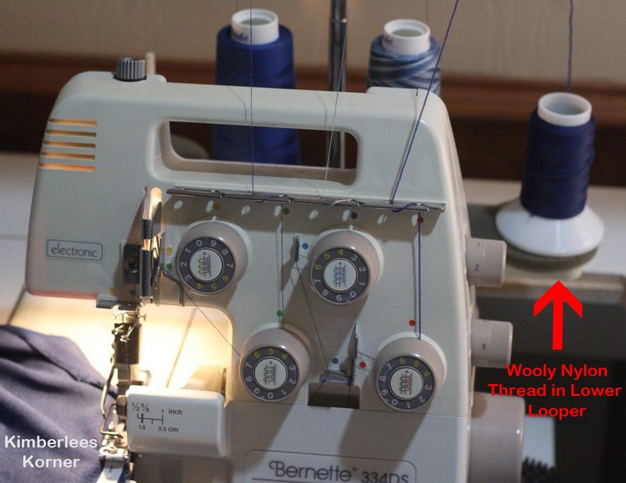 Sewing elastic to bathing suit with serger