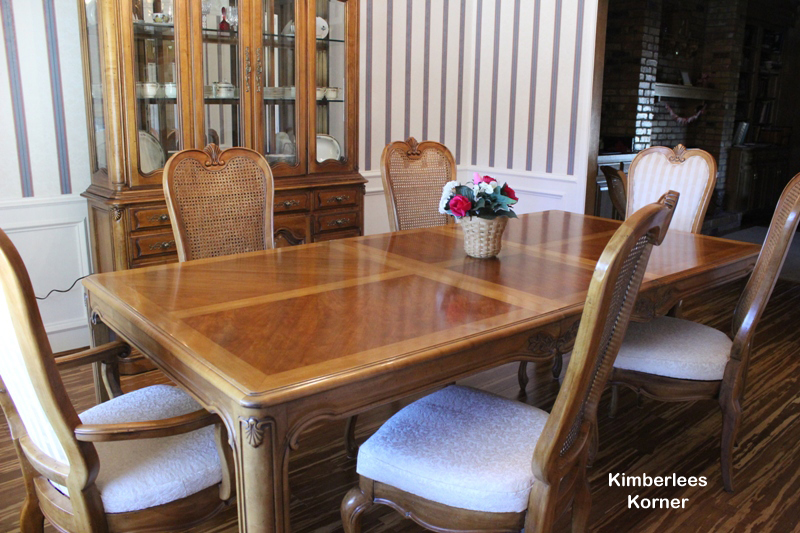 dining room table and china cabinet with recovered chairs