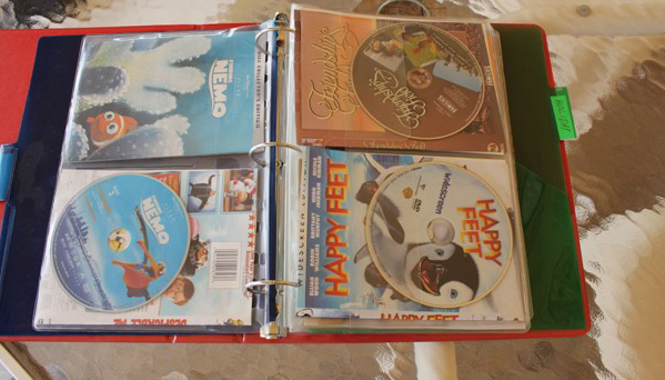 photo of dvd's organized in 3 ring binder