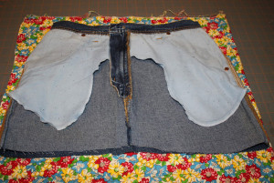 cut out lining by laying denim section over lining fabric