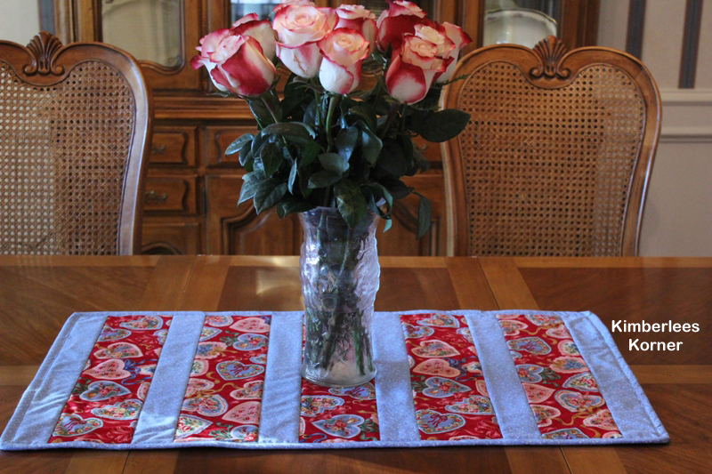 table runner and roses