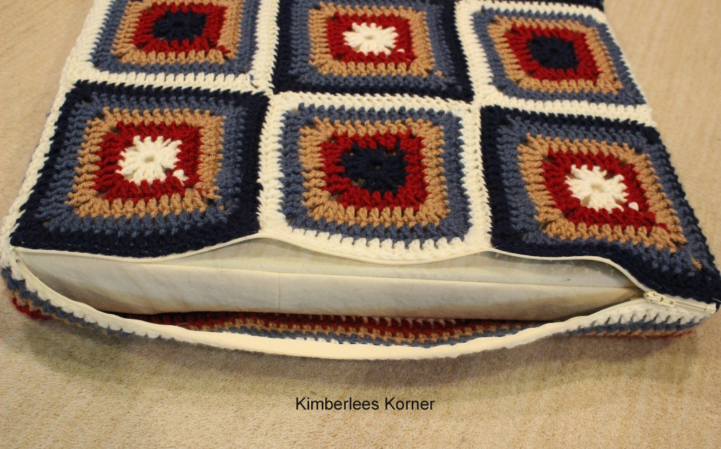 Crocheted motif squares cushion with zipper sewn onto one end from Kimberlees Korner